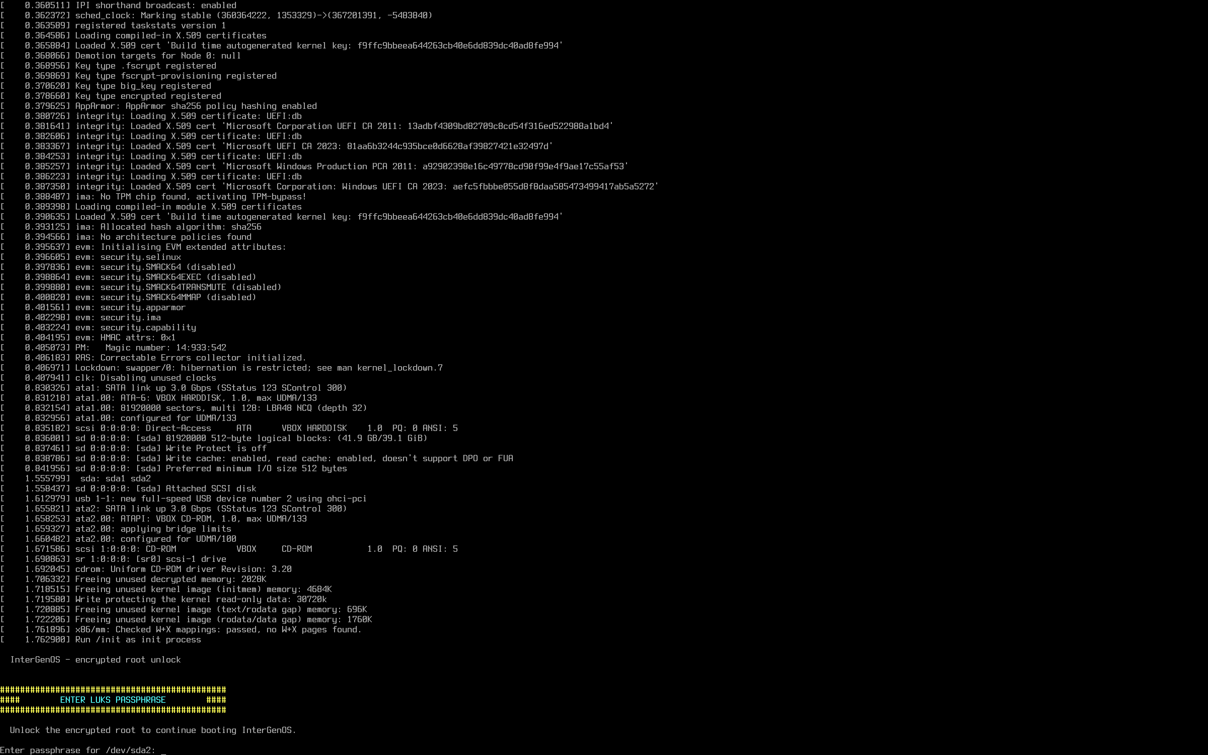 The InterGenOS LUKS passphrase prompt at boot — a bordered “ENTER LUKS PASSPHRASE” banner above the unlock prompt