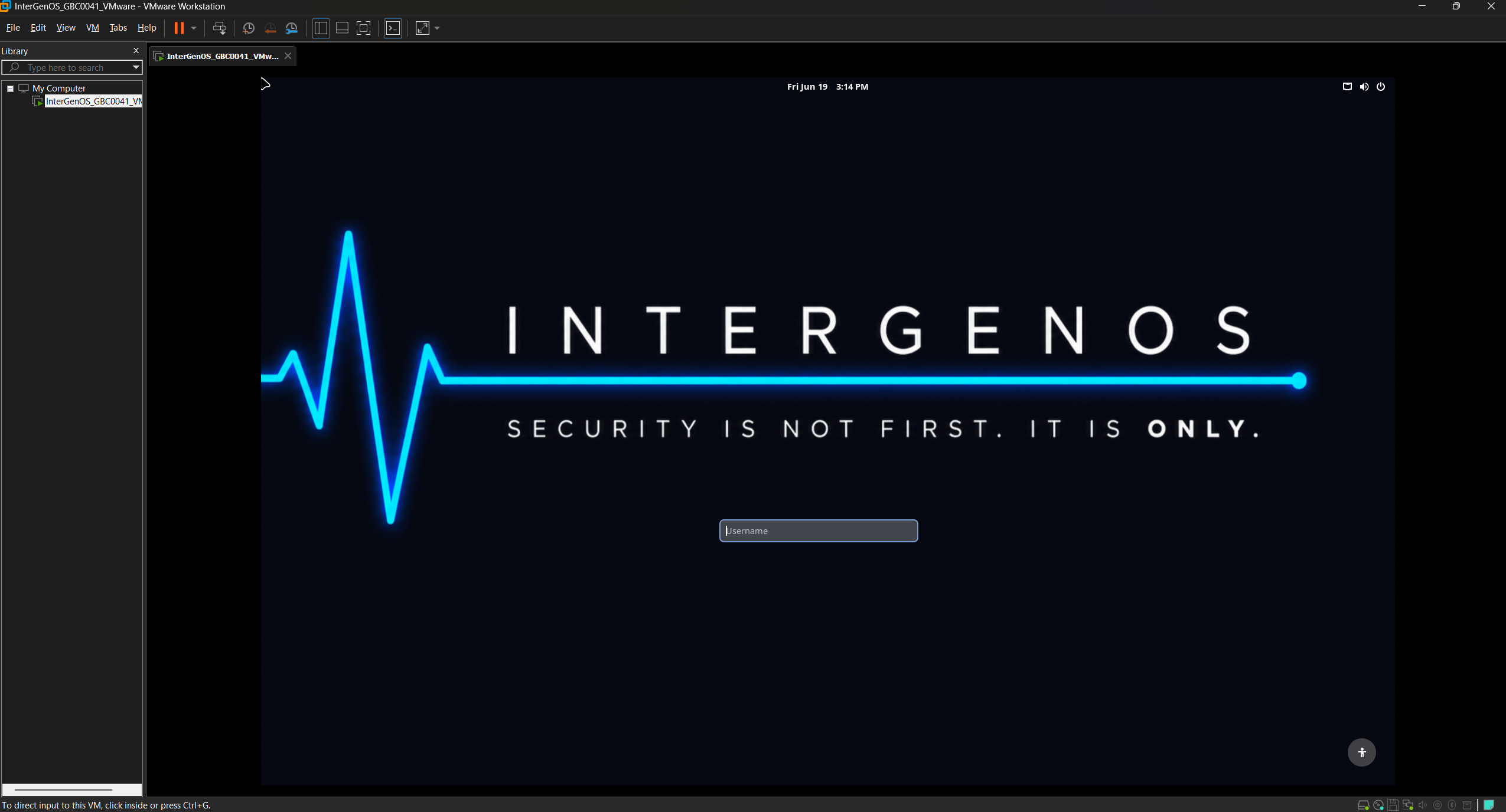 The InterGenOS greeter rendering inside a VMware Workstation window — the INTERGENOS wordmark, the creed, and the login field, crisply scaled